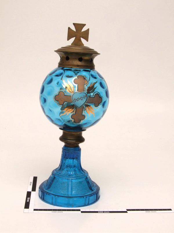 Grablicht aus blauem Glas mit Messinghalterung